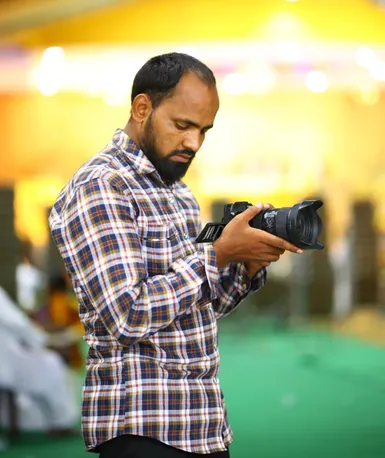 Portrait of the lead wedding photographer